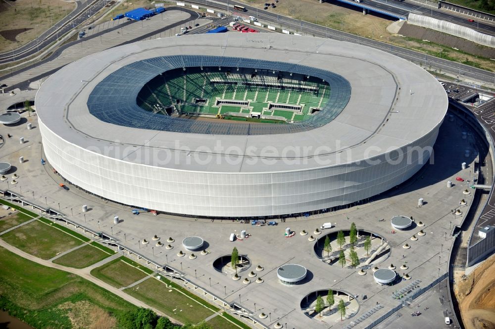 Aerial image Wroclaw / Breslau - Blick auf das Stadion Miejski in Breslau, Niederschlesien in Polen. Das Fußballstadion ist ein Austragungsort der UEFA Fußball-Europameisterschaft EM 2012. Errichtet wurde der Stadion- Neubau durch das Bauunternehmen MAX Bögl nach Entwürfen des deutschen Architekturbüros JSK. The new built stadium Miejski in Wroclaw, Lower Silesia in Poland. The soccer stadium is a venue for the UEFA European Football Championship 2012. The stadium was built by the construction company Max Bögl designed by the German architects JSK.