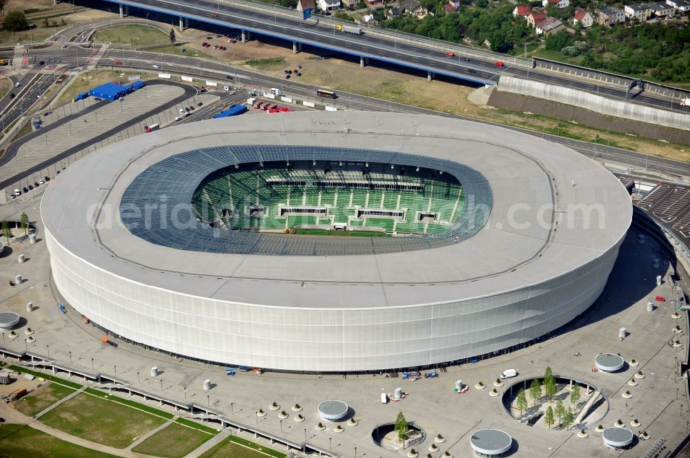 Aerial photograph Wroclaw / Breslau - Blick auf das Stadion Miejski in Breslau, Niederschlesien in Polen. Das Fußballstadion ist ein Austragungsort der UEFA Fußball-Europameisterschaft EM 2012. Errichtet wurde der Stadion- Neubau durch das Bauunternehmen MAX Bögl nach Entwürfen des deutschen Architekturbüros JSK. The new built stadium Miejski in Wroclaw, Lower Silesia in Poland. The soccer stadium is a venue for the UEFA European Football Championship 2012. The stadium was built by the construction company Max Bögl designed by the German architects JSK.