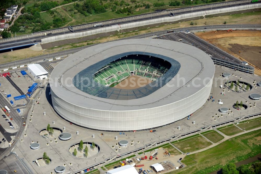 Aerial image Wroclaw / Breslau - Blick auf das Stadion Miejski in Breslau, Niederschlesien in Polen. Das Fußballstadion ist ein Austragungsort der UEFA Fußball-Europameisterschaft EM 2012. Errichtet wurde der Stadion- Neubau durch das Bauunternehmen MAX Bögl nach Entwürfen des deutschen Architekturbüros JSK. The new built stadium Miejski in Wroclaw, Lower Silesia in Poland. The soccer stadium is a venue for the UEFA European Football Championship 2012. The stadium was built by the construction company Max Bögl designed by the German architects JSK.