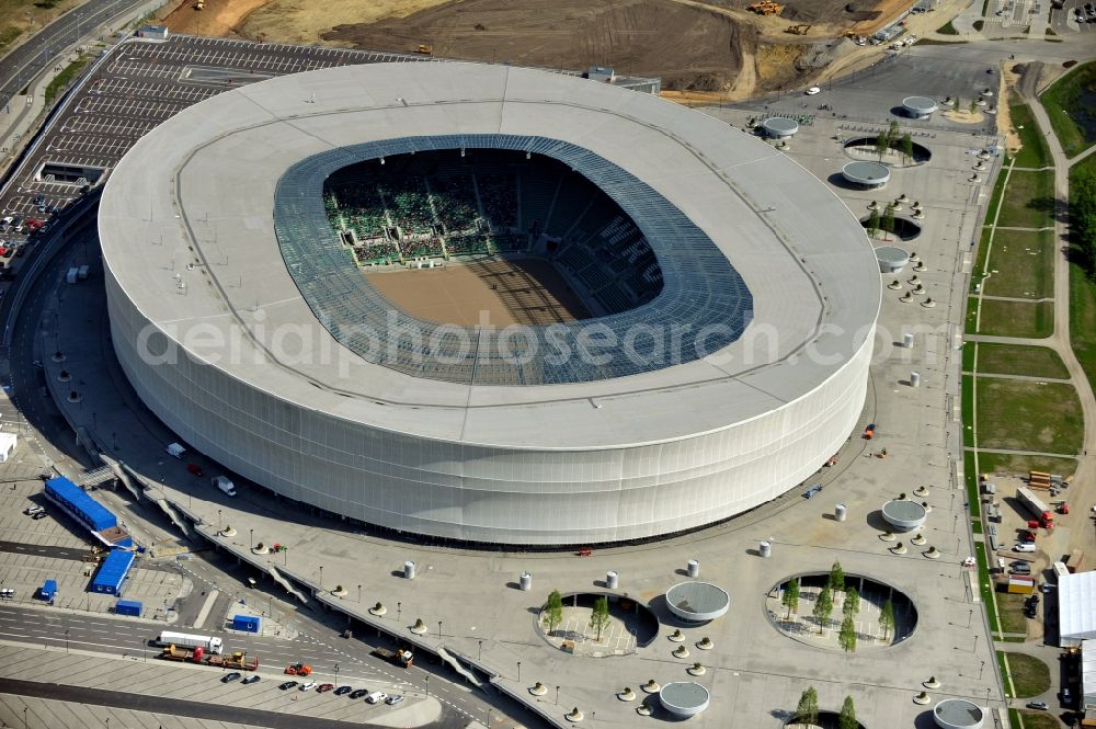 Aerial image Wroclaw / Breslau - Blick auf das Stadion Miejski in Breslau, Niederschlesien in Polen. Das Fußballstadion ist ein Austragungsort der UEFA Fußball-Europameisterschaft EM 2012. Errichtet wurde der Stadion- Neubau durch das Bauunternehmen MAX Bögl nach Entwürfen des deutschen Architekturbüros JSK. The new built stadium Miejski in Wroclaw, Lower Silesia in Poland. The soccer stadium is a venue for the UEFA European Football Championship 2012. The stadium was built by the construction company Max Bögl designed by the German architects JSK.