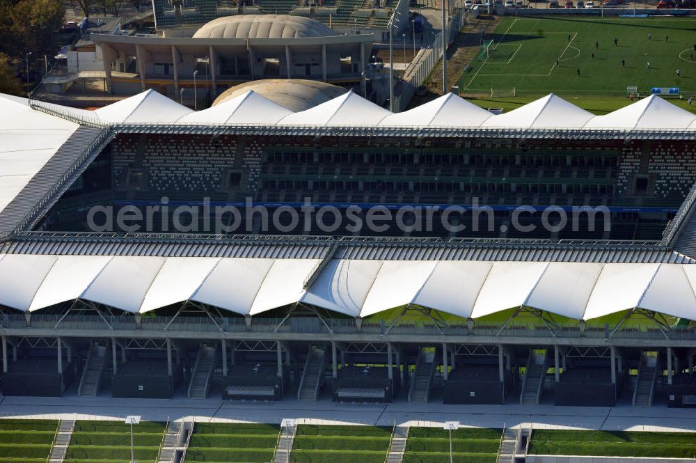 Aerial photograph Warschau / Warszawa / Warsaw - Die Pepsi Arena, vormals: Stadion Wojska Polskiego, deutsch Stadion der Polnischen Armee, in Warschau ist das Fußballstadion des polnischen Vereins Legia Warschau. Der Eigentümer des Stadions ist die Stadt Warschau. Am 19. Juli 2011 vereinbarte der Verein mit der polnischen Abteilung des Softdrink-Herstellers Pepsi einen Sponsorenvertrag über das Namensrecht. The soccer / football stadium Pepsi Arena in Warsaw.