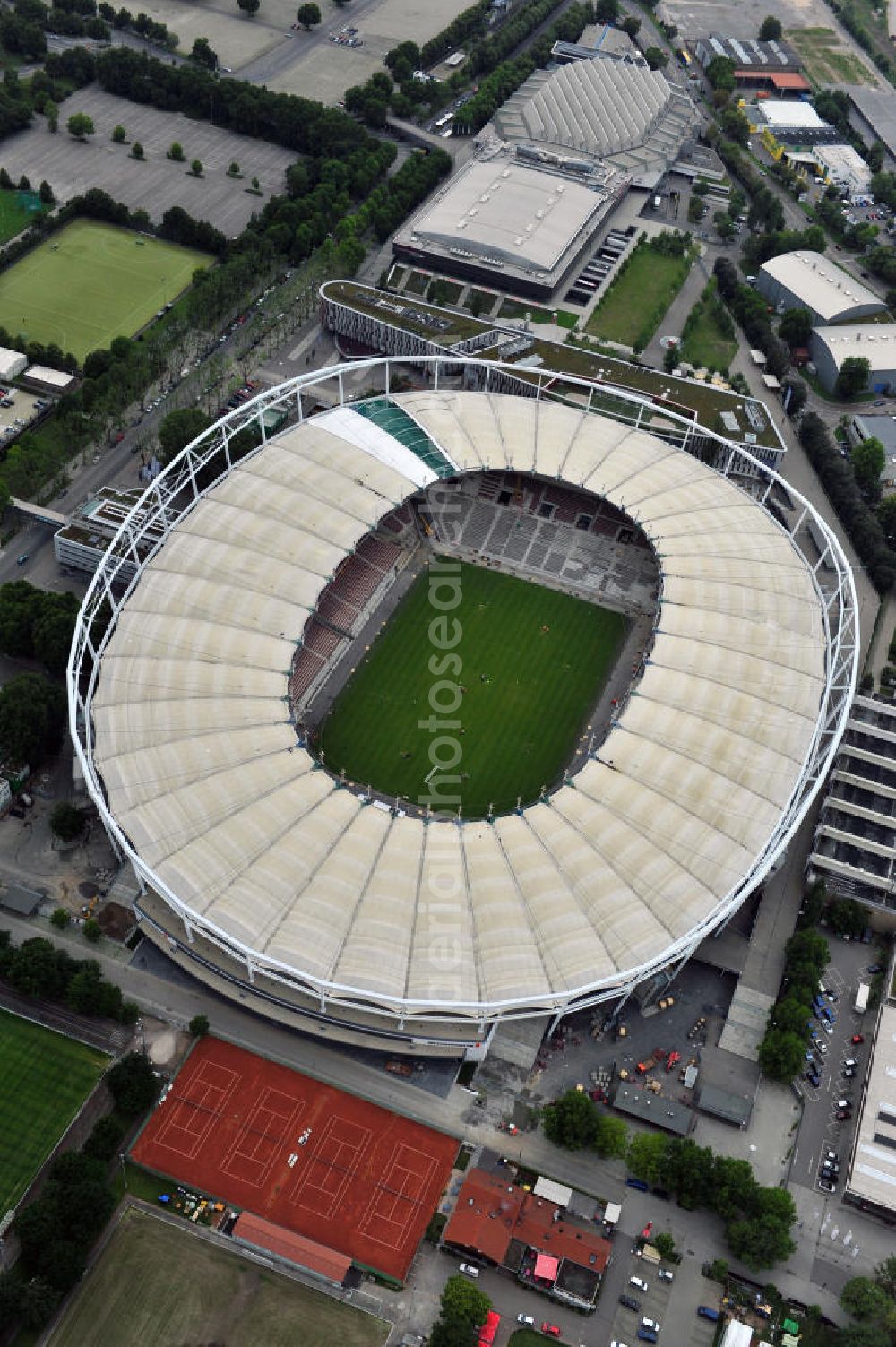 Stuttgart from above - Blick auf das umgebaute Fußballstadion Mercedes-Benz-Arena in Suttgart. Die Stadion NeckarPark GmbH & Co. KG will die Kapazität auf 39.000 Plätze reduzieren, die Kosten des Projekts belaufen sich auf rund 60 Millionen Euro. Für zusätzliche 13,15 Millionen Euro wird außerdem unter der Untertürkheimer Kurve eine Sporthalle entstehen. View of the reconstruction of the stadium Stuttgart (Mercedes-Benz-Arena) to a football-only stadium.