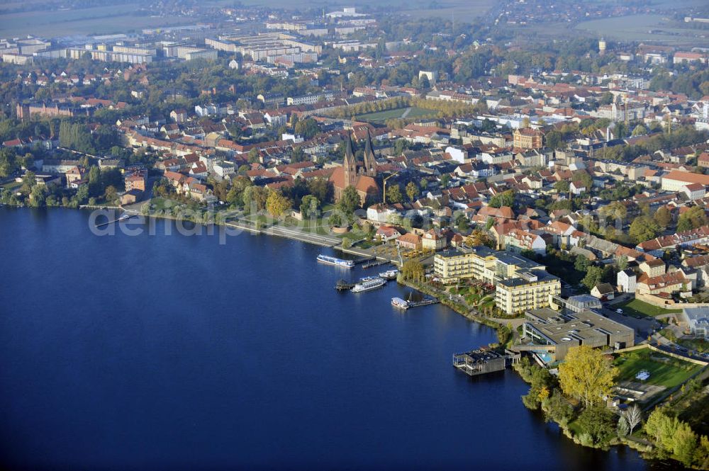 Neuruppin from the bird's eye view: Blick vom Ruppiner See auf die Stadt Neuruppin mit dem Seehotel Fontane und der Klosterkirche St. Trinitatis. View from the Ruppiner See to the city of Neruppin with the Seeholtel Fontane and the abbey church St.Trinitatis .