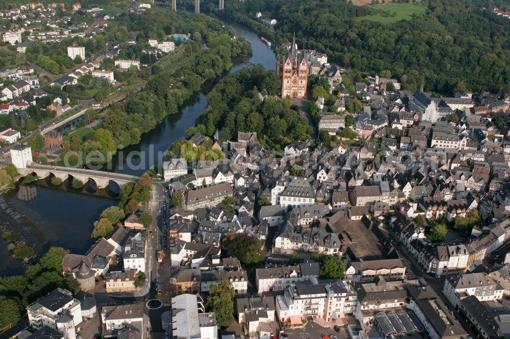 Limburg an der Lahn from above - View of the historic town centre of Limburg on the river Lahn in the state of Hesse. Limburg Cathedral - built from 948 - is standing with its distinct colour and twin towers on the riverbank of the Lahn. The old Lahn bridge connects the two parts of Limburg