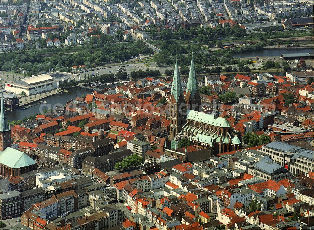 Lübeck from above - Stadtansicht vom Altstadtzentrum in Lübeckmit der Marienkirche , dem Holstentor und der St.-Petri-Kirche. Townscape from the historic center and the old town in Lübeck.