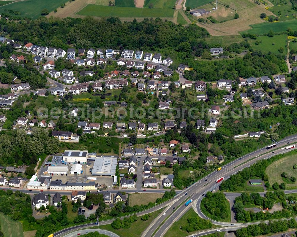 Aerial photograph Bendorf - View of the town of Bendorf in the state of Rhineland-Palatinate. The town is located in the county district of Mayen-Koblenz on the right riverbank of the river Rhine. The town is an official tourist resort and is located on the German Limes Road. It consists of the four parts Bendorf, Sayn, Muelhofen and Stromberg. The federal highway B42 takes its course through the town and meets the federal motorway A48 in the South of the town