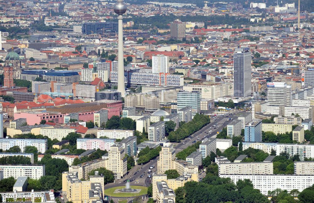 Berlin Mitte from above - Stadtansicht entlang der Karl-Marx-Allee mit dem Strausberger Platz in Richtung Berlin-Mitte mit Fernsehturm am Alexanderplatz. Townscape along the street Karl-Marx-Allee with the square Strausbergerplatz in the direction to the TV tower at the public square Alexanderplatz.