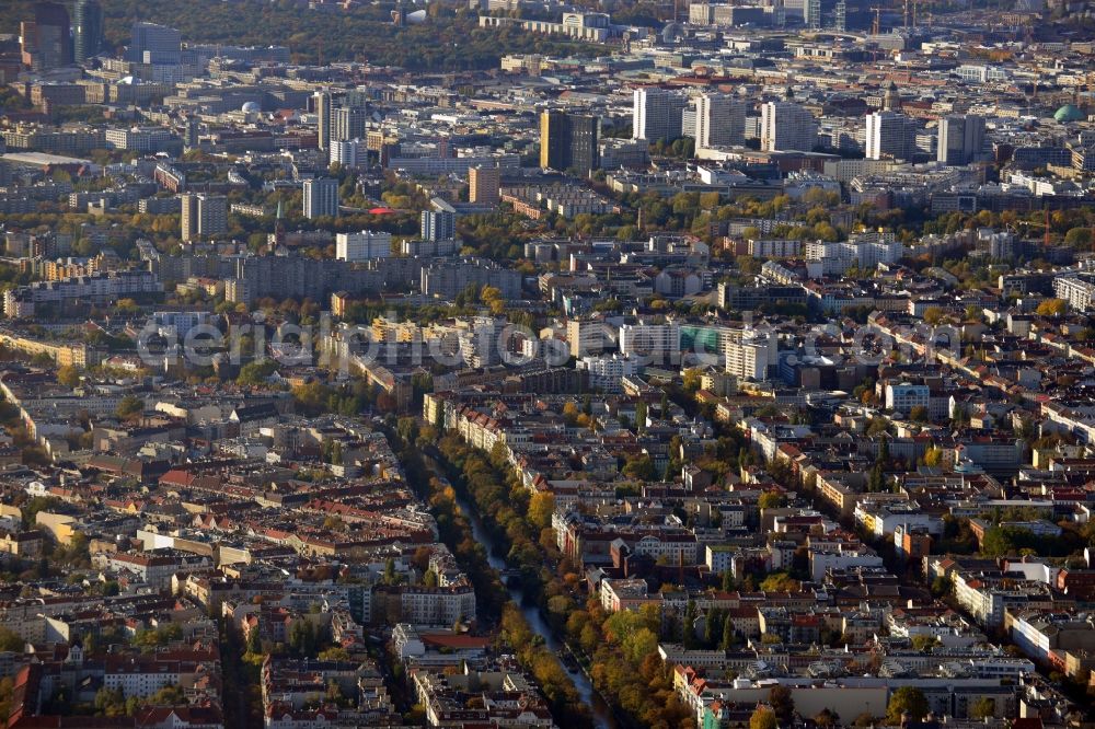 Aerial photograph Berlin - Cityscape overlooking the district of Kreuzberg along Landwehrkanal and Reichenberger Strasse with a view of skyscrapers in Berlin - Mitte