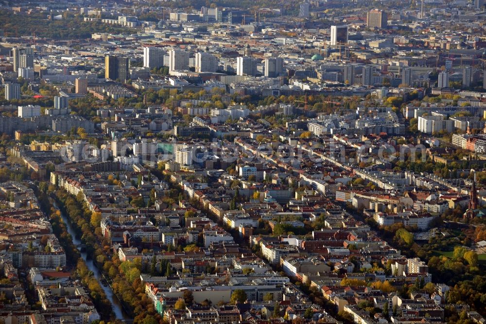 Berlin from above - Cityscape overlooking the district of Kreuzberg along Landwehrkanal and Reichenberger Strasse with a view of skyscrapers in Berlin - Mitte