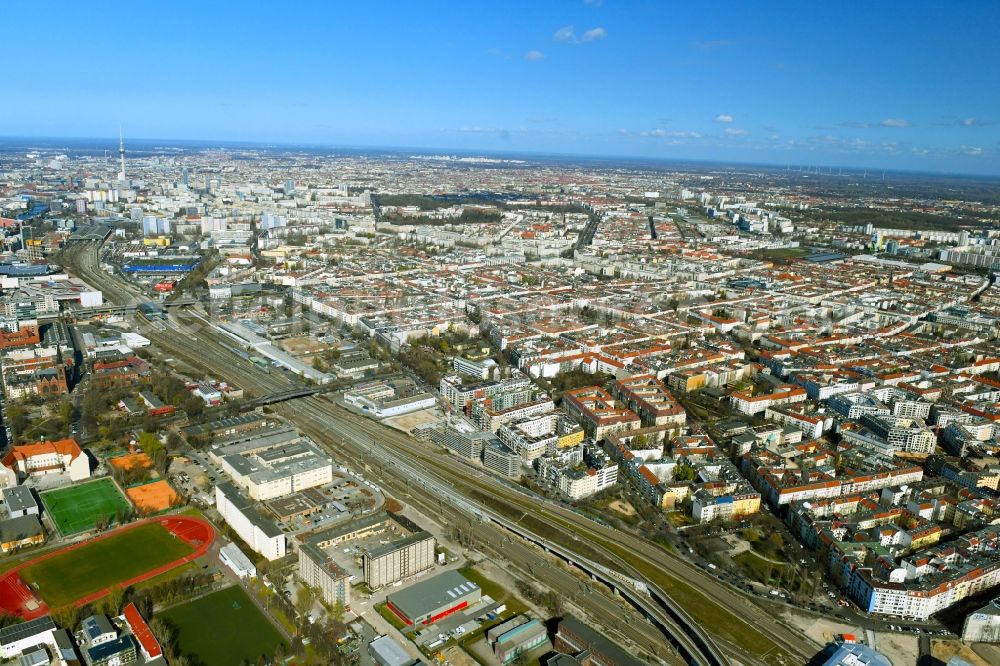 Aerial image Berlin - Downtown area with a view along the S-Bahn tracks S3, S5 and S7 over Friedrichshain in the urban area in Berlin, Germany