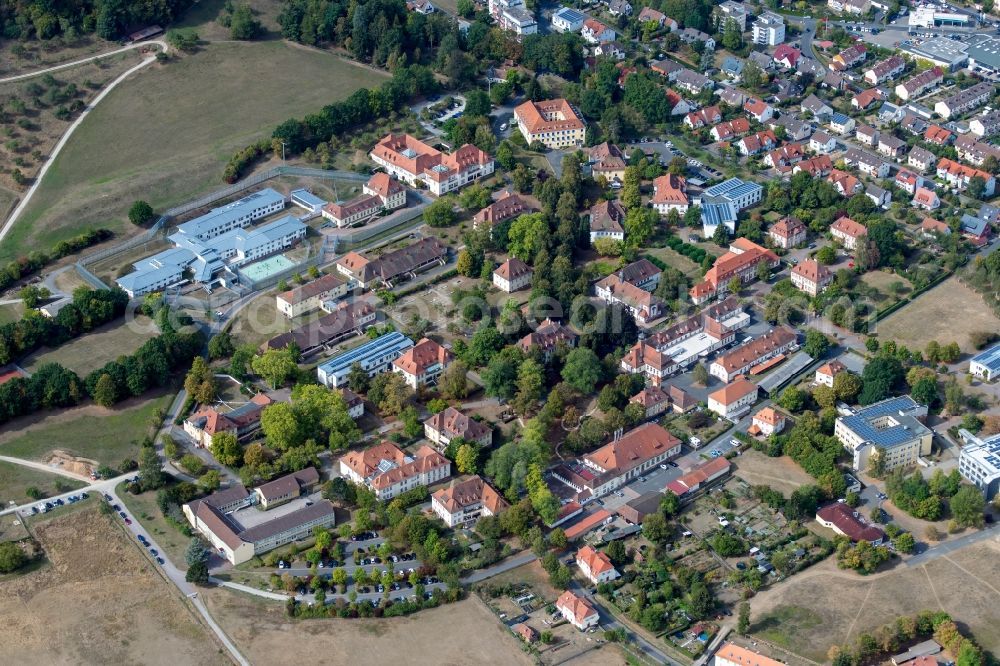 Aerial image Lohr am Main - District overlooking the Krankenhaus fuer Psychiatrie, Psychotherapie and Psychosomatische Medizin Am Sommerberg in the city in the district Wombach in Lohr am Main in the state Bavaria, Germany