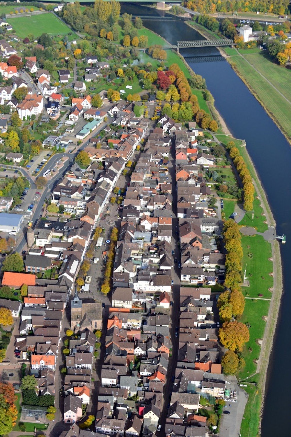 Bodenwerder from above - Cityscape of Bodenwerder in the state Lower Saxony. This city is watered by the Weser river