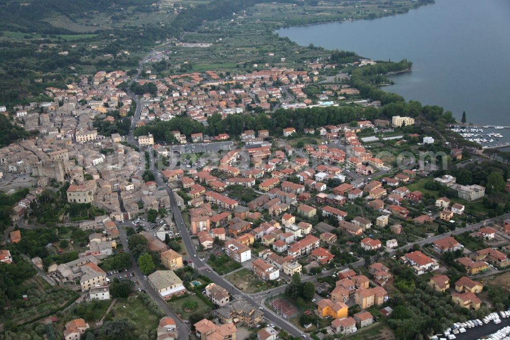 Bolsena from the bird's eye view: Cityscape of Bolsena on the northern edge of Lake Bolsena in Lazio in Italy. About today's town is enthroned a medieval castle, the Rocca Monaldeschi della Cervara