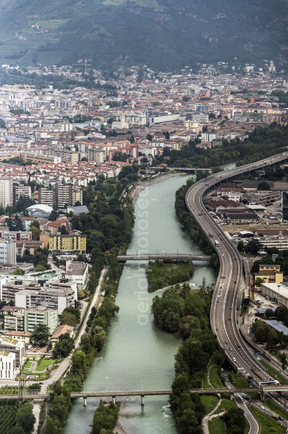 Bozen from above - View of the city Bonzen in Trentino-South Tyrol in Italy. The Tafler river flows through the city. The highway A 22 Brennero proceeds next to the river