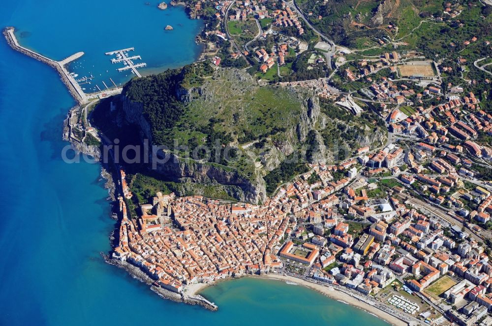 Aerial image Cefalu - City view of Cefalu northern coast of Sicily, at the foot of Mount Rocca Cefalu in Sicily, Italy