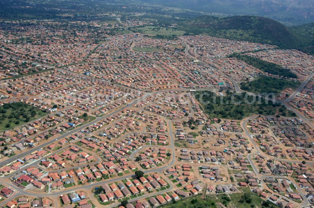 14.02.2010 from the bird's eye view: Stadtansicht von Rustenburg, in der Nordwest Provinz von Südafrika, einem Austragungsort der Fußball- Weltmeisterschaft 2010. Cityscape from Rustenburg in the North West Province of South Africa, a venue of the 2010 FIFA World Cup.