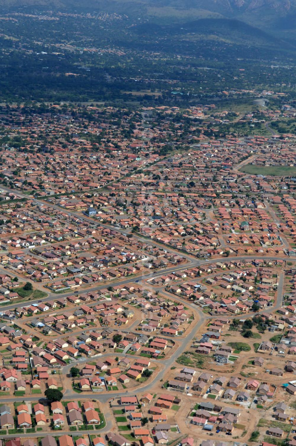 Aerial photograph 14.02.2010 - Stadtansicht von Rustenburg, in der Nordwest Provinz von Südafrika, einem Austragungsort der Fußball- Weltmeisterschaft 2010. Cityscape from Rustenburg in the North West Province of South Africa, a venue of the 2010 FIFA World Cup.