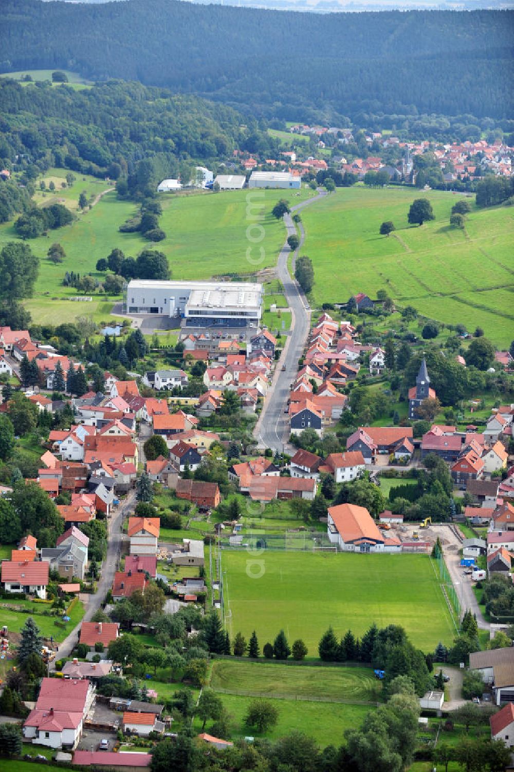 Aerial photograph Emsetal OT Schmerbach - Cityscape of Schmerbach with the church at the street Waltershauser Strasse in the Thuringian Forest in Thuringia