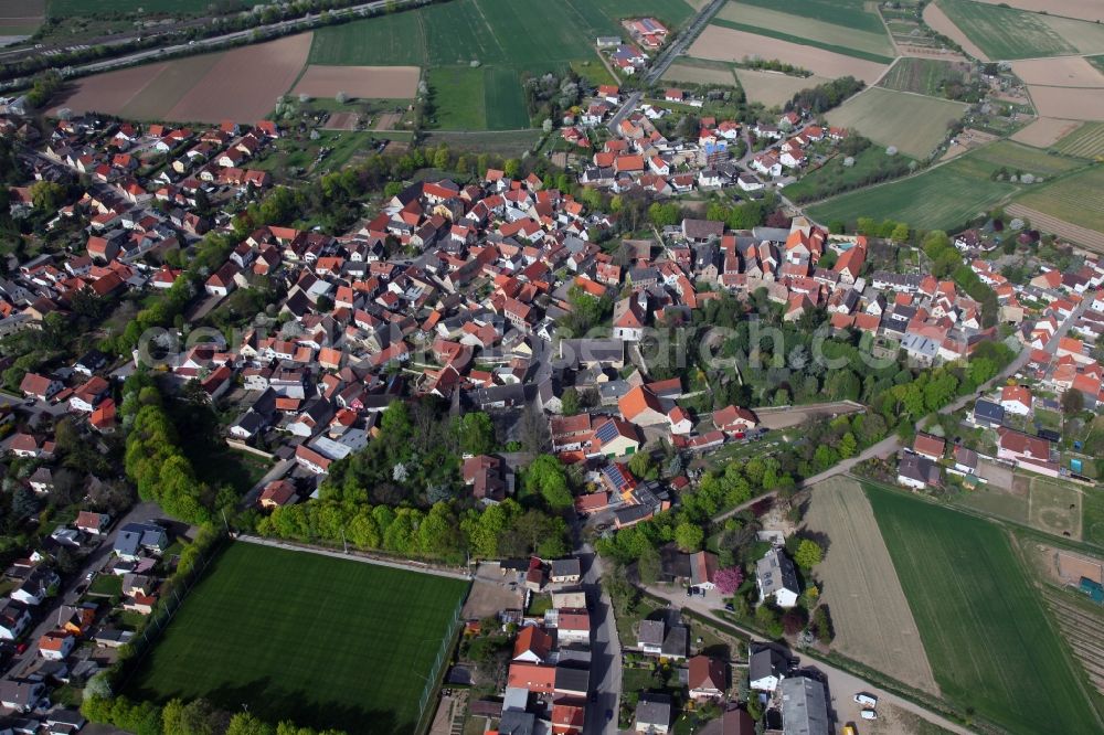 Aerial image Eppelsheim - City view of Eppelsheim, a municipality of Rheinhessen in the district Alzey Worms in the state of Rhineland-Palatinate. The locality belongs to the municipality Alzey-Land. The village ditch, also called Effenring, included heart-shaped the medieval village and served with its heaped high ramparts as a village fastening