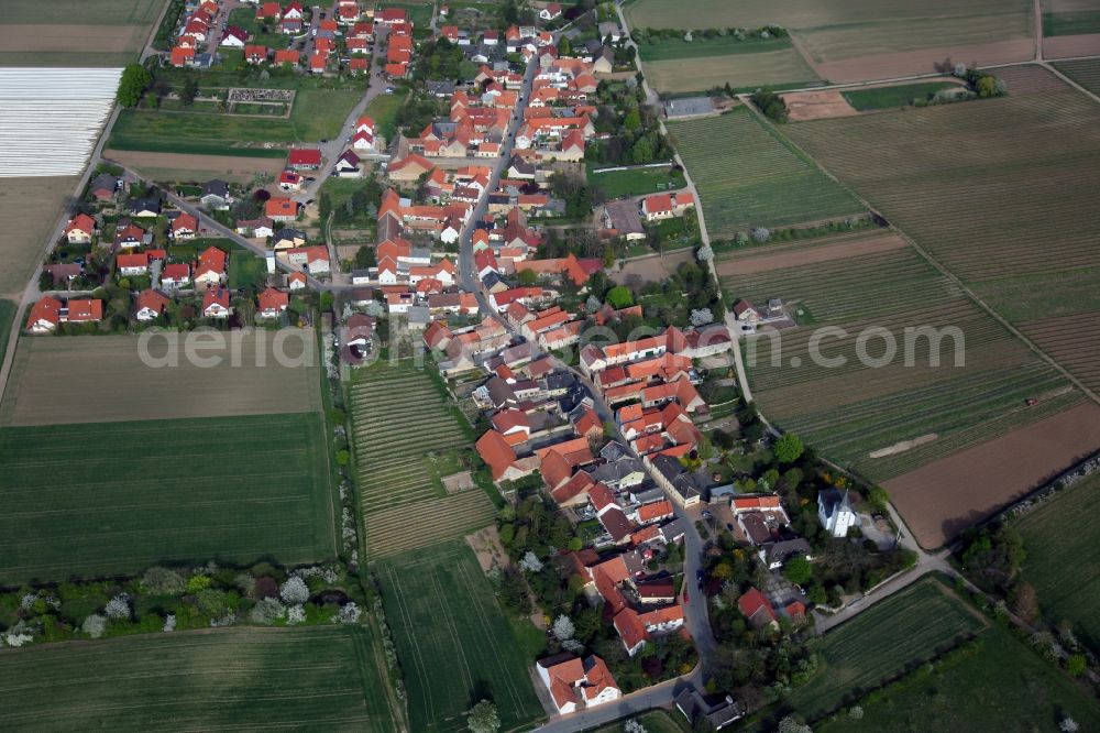 Esselborn from above - City view of Esselborn in the district Alzey Worms in the state of Rhineland-Palatinate. On the edge of town lies a protestant church in baroque / perpendicular style, formerly St. Peter. The church building is a cultural monument