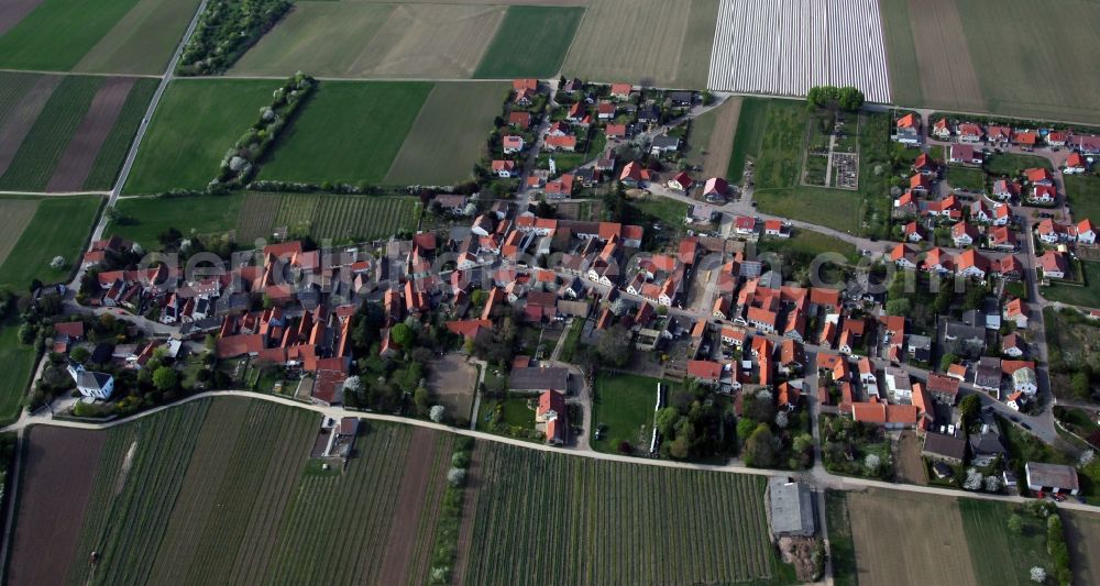 Esselborn from above - City view of Esselborn in the district Alzey Worms in the state of Rhineland-Palatinate. On the edge of town lies a protestant church in baroque / perpendicular style, formerly St. Peter. The church building is a cultural monument