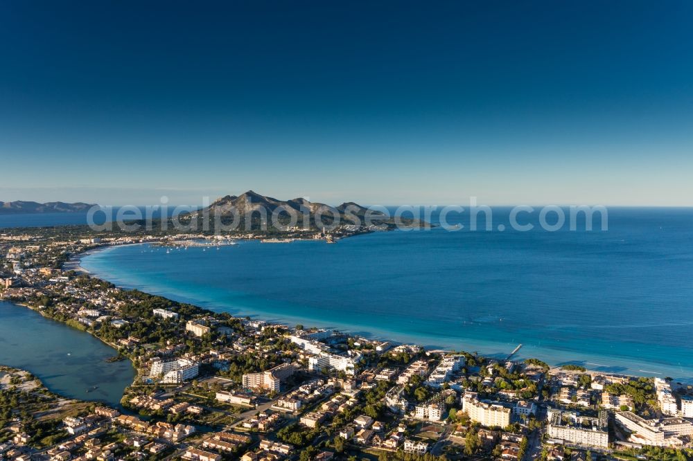 Muro from the bird's eye view: View of the resort town of Muro on the Mediterranean coast of the Spanish Balearic island of Mallorca in Spain