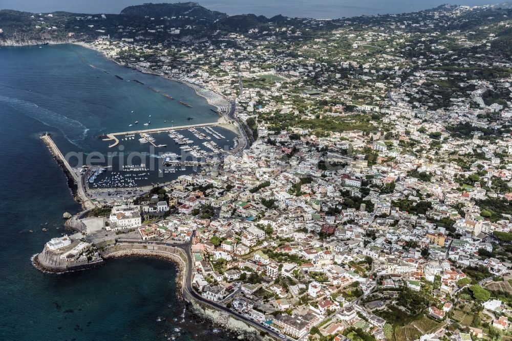 Forio from above - Cityscape with a marina and the church of Santa Maria del Soccorso in Forio on the island of Ischia in the Mediterranean Sea in Italy