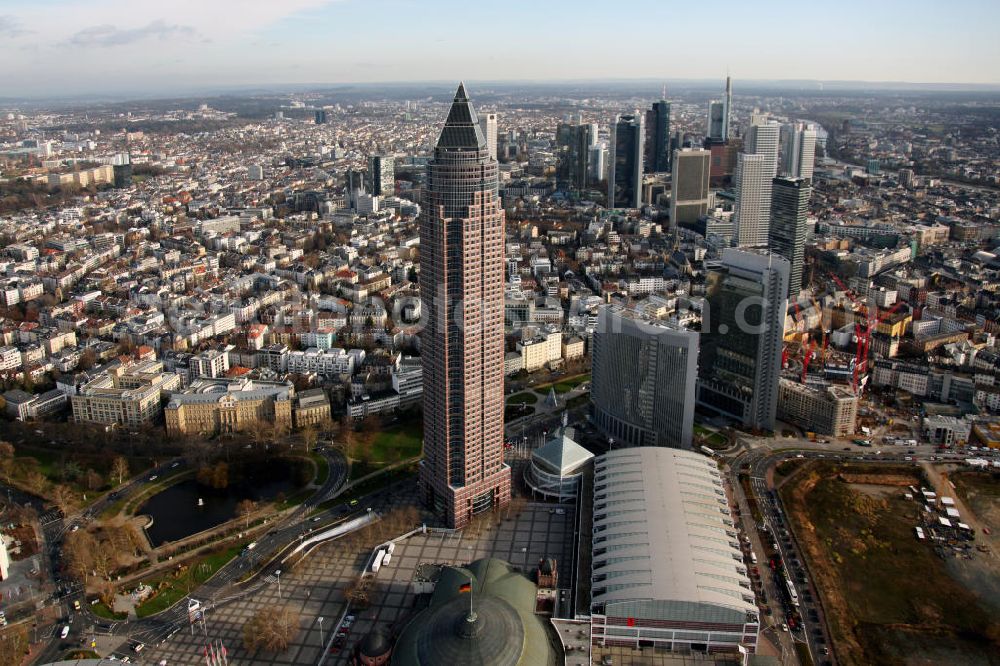 Aerial photograph Frankfurt am Main - Blick auf die Frankfurter Innenstadt mit dem Messeturm, einem bekannten Büro-und Geschäftsgebäude. Der Büroturm auf dem Frankfurter Messegelände war bei seiner Fertigstellung 1991 das höchste Gebäude in Europa. View to the inner city of Frankfurt at the Main, with the Frankfurt landmark tower.