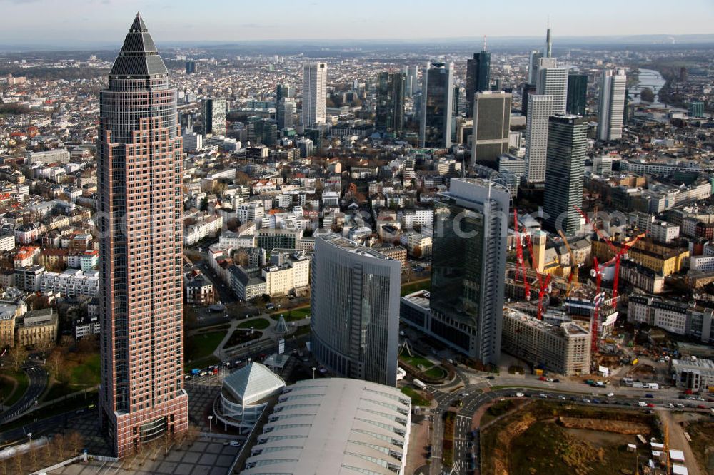 Aerial image Frankfurt am Main - Blick auf die Frankfurter Innenstadt mit dem Messeturm, einem bekannten Büro-und Geschäftsgebäude. Der Büroturm auf dem Frankfurter Messegelände war bei seiner Fertigstellung 1991 das höchste Gebäude in Europa. View to the inner city of Frankfurt at the Main, with the Frankfurt landmark tower.