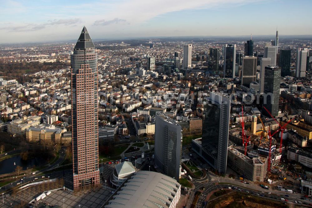 Aerial photograph Frankfurt am Main - Blick auf die Frankfurter Innenstadt mit dem Messeturm, einem bekannten Büro-und Geschäftsgebäude. Der Büroturm auf dem Frankfurter Messegelände war bei seiner Fertigstellung 1991 das höchste Gebäude in Europa. View to the inner city of Frankfurt at the Main, with the Frankfurt landmark tower.