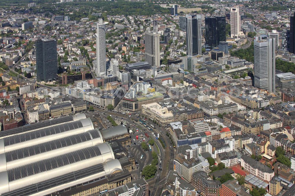 Frankfurt am Main from above - Blick auf die Frankfurter Skyline am Main. Das Frankfurter Banken-, und Bürohauszentrum reiht die Mainmetropole in die Liste typische europäischer Hochhausstädte ein. View of the Frankfurt am Main skyline. The Frankfurt banking, and office center joins a list of the main metropolis in the typical high-rise European citys.