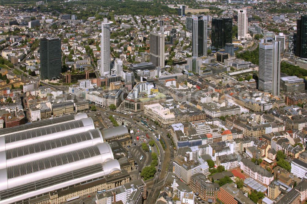 Frankfurt am Main from the bird's eye view: Blick auf die Frankfurter Skyline am Main. Das Frankfurter Banken-, und Bürohauszentrum reiht die Mainmetropole in die Liste typische europäischer Hochhausstädte ein. View of the Frankfurt am Main skyline. The Frankfurt banking, and office center joins a list of the main metropolis in the typical high-rise European citys.