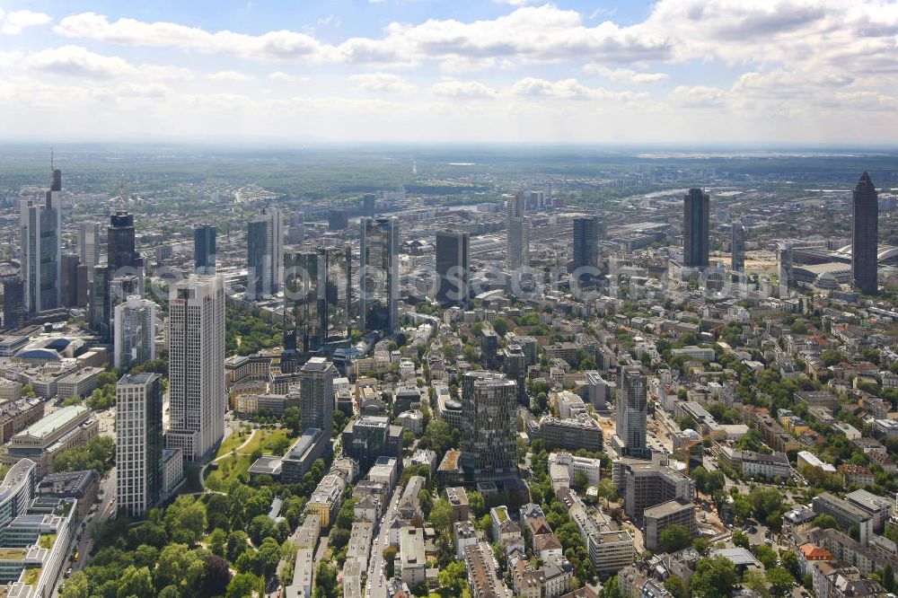 Frankfurt am Main from above - Blick auf die Frankfurter Skyline am Main. Das Frankfurter Banken-, und Bürohauszentrum reiht die Mainmetropole in die Liste typische europäischer Hochhausstädte ein. View of the Frankfurt am Main skyline. The Frankfurt banking, and office center joins a list of the main metropolis in the typical high-rise European citys.