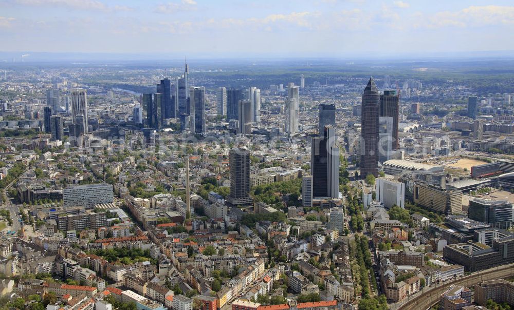 Frankfurt am Main from the bird's eye view: Blick auf die Frankfurter Skyline am Main. Das Frankfurter Banken-, und Bürohauszentrum reiht die Mainmetropole in die Liste typische europäischer Hochhausstädte ein. View of the Frankfurt am Main skyline. The Frankfurt banking, and office center joins a list of the main metropolis in the typical high-rise European citys.