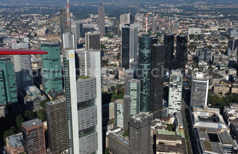 Frankfurt am Main from the bird's eye view: Blick auf die Frankfurter Skyline am Main. Das Frankfurter Banken-, und Bürohauszentrum reiht die Mainmetropole in die Liste typische europäischer Hochhausstädte ein. View of the Frankfurt am Main skyline. The Frankfurt banking, and office center joins a list of the main metropolis in the typical high-rise European citys.