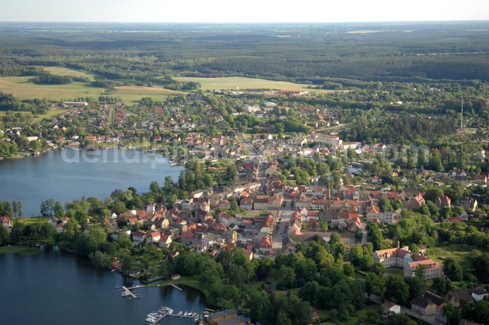 Fürstenberg from above - Blick auf die Stadt Fürstenberg/ Havel. Sie hat eine über 3000jährige Geschichte und wurde ursprünglich auf der Insel Große Werder gegründet. Die Stadt wird von 3 Seen umschlossen und durch die Stadt fließt die Havel. Sie liegt am Rand der Mecklenburgischen Seenplatte. Ca. 6.450 Einwohner hat die Stadt. Kontakt: Stadt Fürstenberg/ Havel, Markt1, 16798 Fürstenberg/ Havel, Tel. 033093 / 346 0, info@stadt-fürstenberg-havel.de