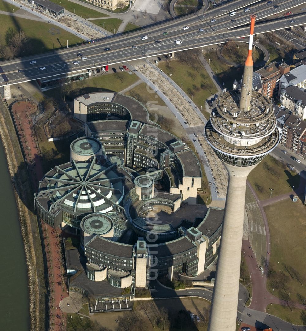 Düsseldorf from the bird's eye view: View of the site of the television tower Rhine Tower and the buildings of Parliament in Dusseldorf in North Rhine-Westphalia NRW. The Rheinturm carries aerials for directional radio, FM and TV transmitters and DVB-T