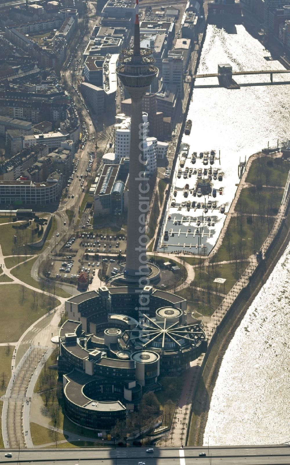 Düsseldorf from the bird's eye view: View of the site of the television tower Rhine Tower and the buildings of Parliament in Dusseldorf in North Rhine-Westphalia NRW. The Rheinturm carries aerials for directional radio, FM and TV transmitters and DVB-T