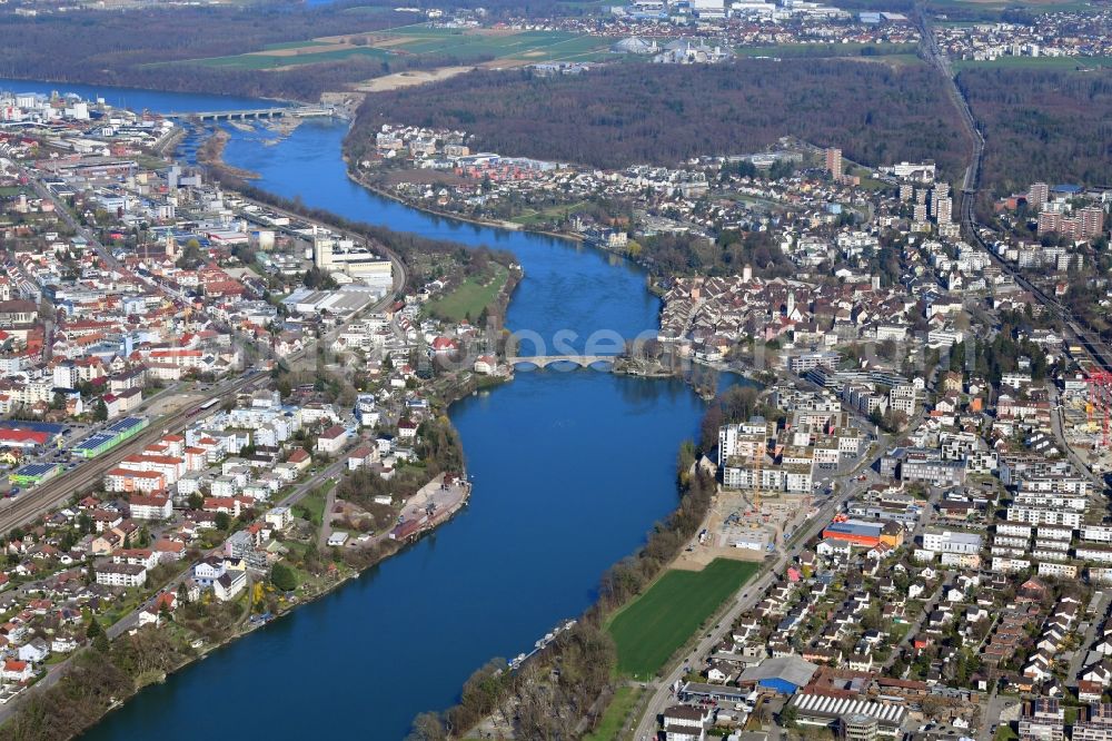 Rheinfelden (Baden) from above - City view on the river bank of the Rhine river showing Germany on the left and Switzerland (right) in Rheinfelden (Baden) in the state Baden-Wurttemberg, Germany. The old historical Bridge is connecting the two towns