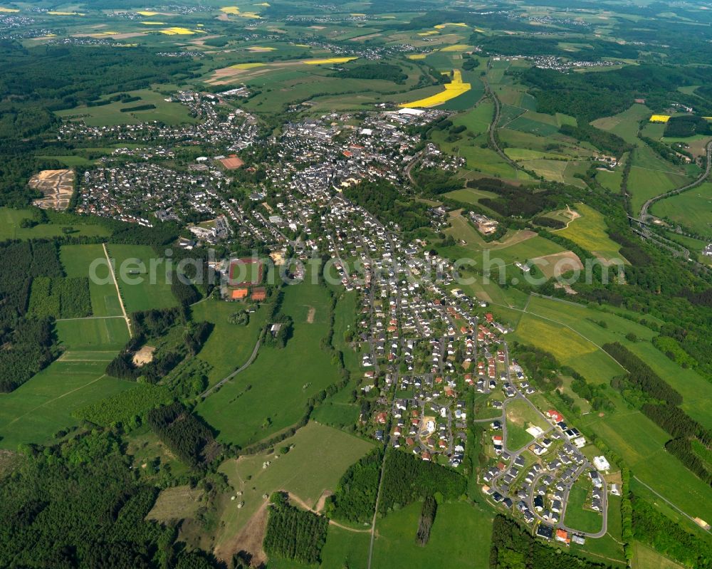 Hachenburg from the bird's eye view: View of the town of Hachenburg in the state of Rhineland-Palatinate. The town is an official spa resort in the Westerwald region and county district. It is surrounded by agricultural fields and meadows