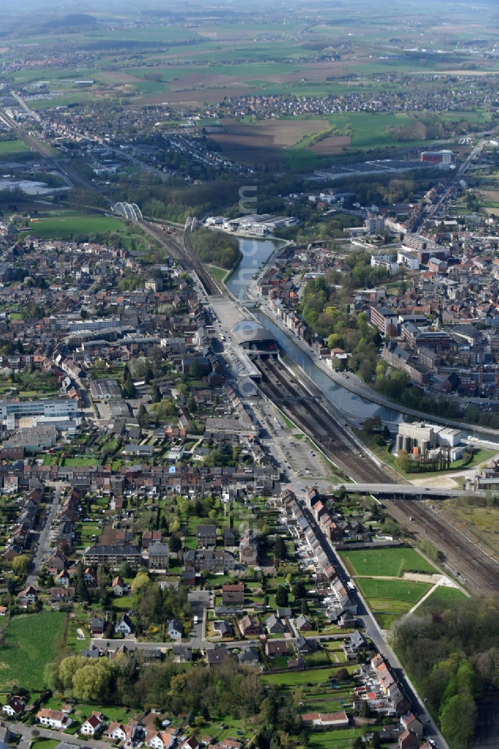 Halle from the bird's eye view: City view with railway station at the course of the river Brussels-Charleroi Canalin in Halle in Flan ders, Belgium