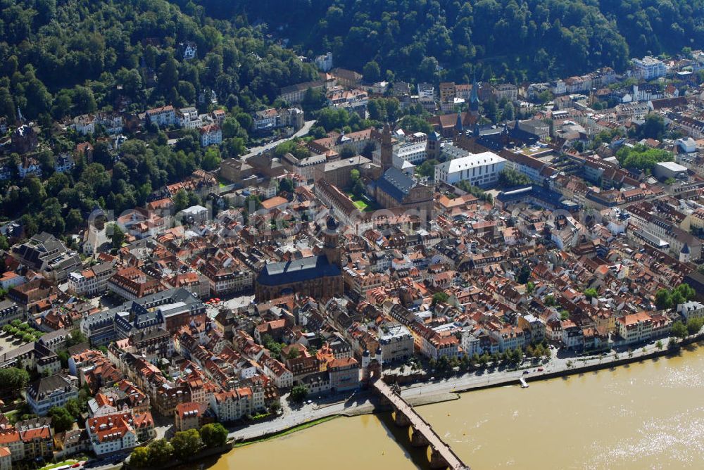 Aerial photograph Heidelberg - Stadtansicht mit Blick auf die drei Kirchen Heidelbergs. Heidelberg ist eine Großstadt am Neckar im Südwesten Deutschlands. Mit über 140.000 Einwohnern ist Heidelberg die fünftgrößte Stadt Baden-Württembergs. Sie ist kreisfreie Stadt und zugleich Sitz des umliegenden Rhein-Neckar-Kreises. Die Heiliggeistkirche, links im Bild, ist die bekannteste Kirche von Heidelberg. Sie steht am Marktplatz mitten im alten Zentrum von Heidelberg, nur unweit vom Heidelberger Schloss entfernt und b???????????????????????????????????????????????????????????????????????????????????????????????????????????????????????????????????????????????????????????????????????????????????????????????????????????????????????????????????????????????????????????????????????????????????????????????????????????????????????????????????????????????????????????????????????????????????????????????????????????????????????????????????????????????????????????????????????????????????????????????????????????????????????????????