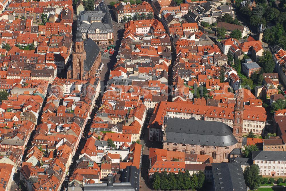 Aerial photograph Heidelberg - Stadtansicht mit Blick auf zwei Kirchen Heidelbergs. Heidelberg ist eine Großstadt am Neckar im Südwesten Deutschlands. Mit über 140.000 Einwohnern ist Heidelberg die fünftgrößte Stadt Baden-Württembergs. Sie ist kreisfreie Stadt und zugleich Sitz des umliegenden Rhein-Neckar-Kreises. Die Heiliggeistkirche (oben) ist die bekannteste Kirche von Heidelberg. Sie steht am Marktplatz mitten im alten Zentrum von Heidelberg, nur unweit vom Heidelberger Schloss entfernt und beherrscht mit ih???????????????????????????????????????????????????????????????????????????????????????????????????????????????????????????????????????????????????????????????????????????????????????????????????????????????????????????????????????????????????????????????????????????????????????????????????????????????????????????????????????????????????????????????????????????????????????????????????????????????????????????????????????????????????????????????????????????????????????????????????????????????????????????????