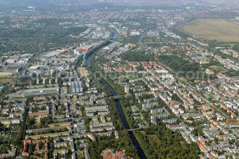 Berlin from the bird's eye view: City view of the industrial area at the river site of the Teltowkanal with the bridges of the Britzer Damm and the Rungiusstrasse in the district Britz in Berlin in Germany