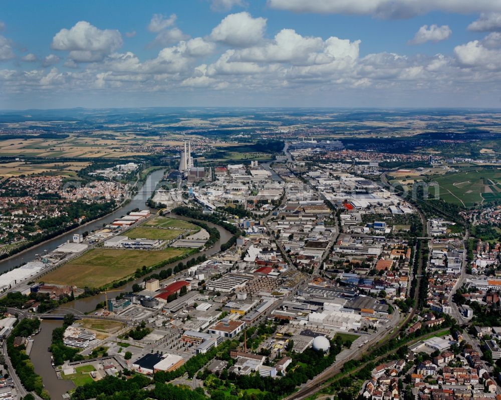 Aerial image Heilbronn - City view of the industrial area and stone coal power station on the river Neckar in Heilbronn in the state of Baden-Wuerttemberg. The area is located on the riverbank of the Neckar. The power plant includes the largest stone coal block of the EnBW Kraftwerke AG company