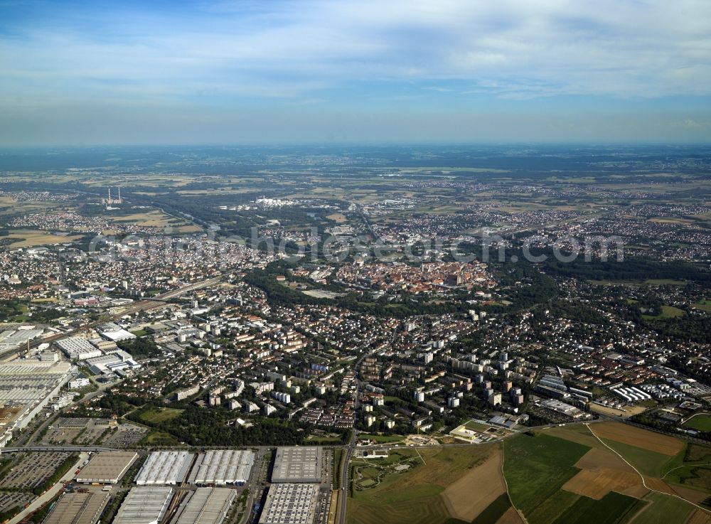 Aerial photograph Ingolstadt - Cityscape of Ingolstadt in the state of Bavaria. View from the North over the Audi Forum and works towards the historic town centre which is surrounded by trees and the river Danube