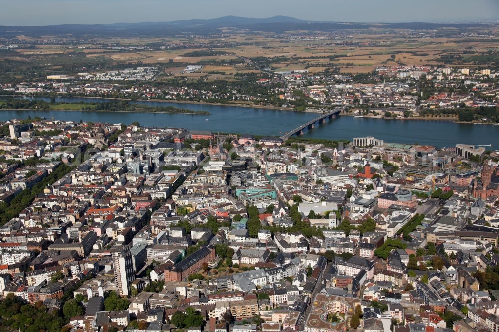 Mainz from above - View of the city centre of Mainz in the state of Rhineland-Palatinate. Mainz is state capitol and largest city of Rhineland-Palatinate. A university, several TV and radio broadcasting stations and the carneval are characteristic features of the city on the river Rhine - which is located in the background. The Cathedral of Mainz is located in its city centre