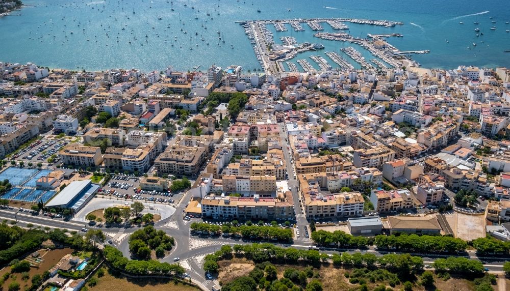 Aerial photograph Port de Pollenca - City view on down town on Carrer del Llebeig - Carrer de la Tramuntana along the Ma-2200 in Port de Pollenca in Balearic island of Mallorca, Spain