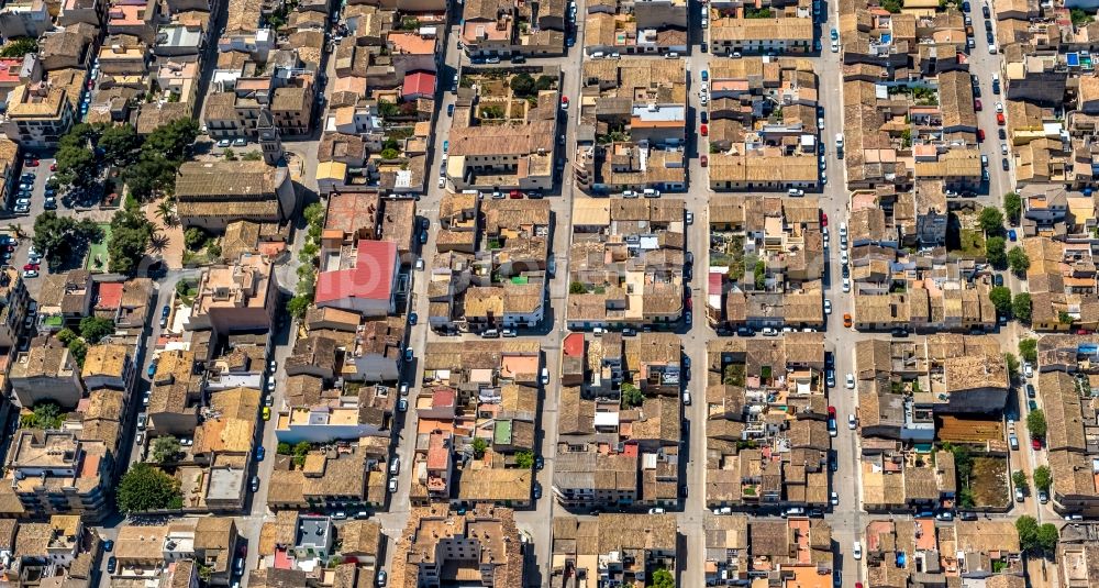 Porto Cristo from the bird's eye view: City view on down town with an apartment complex on Carrer de l'EcA?nom Pere Gelabert in Porto Cristo in Balearic island of Mallorca, Spain