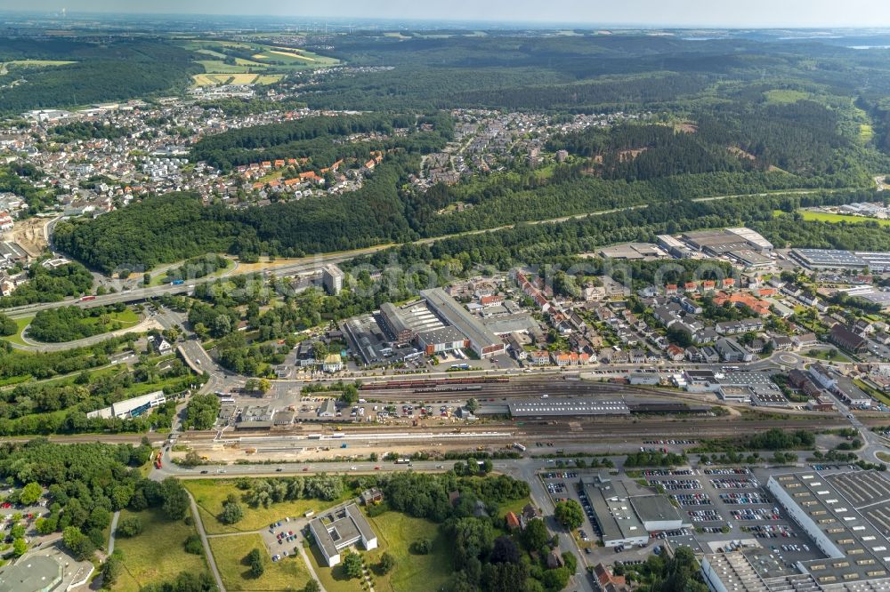 Aerial image Arnsberg - City view of downtown area along the Autobahn A46 with dem Bahnhof Neheim-Huesten in Arnsberg in the state North Rhine-Westphalia, Germany